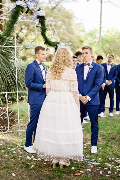 South-carolina-summer-outdoor-wedding-at-the-wickliffe-house-ceremony-bride-and-groom-holding-hands