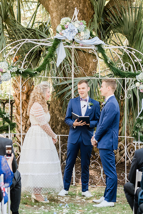 South-carolina-summer-outdoor-wedding-at-the-wickliffe-house-ceremony-bride-and-groom-standing-side-view