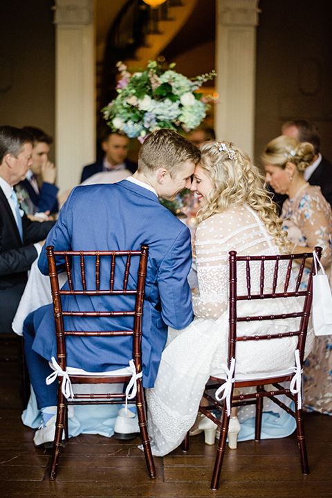 South-carolina-summer-outdoor-wedding-at-the-wickliffe-house-reception-bride-and-groom-sitting