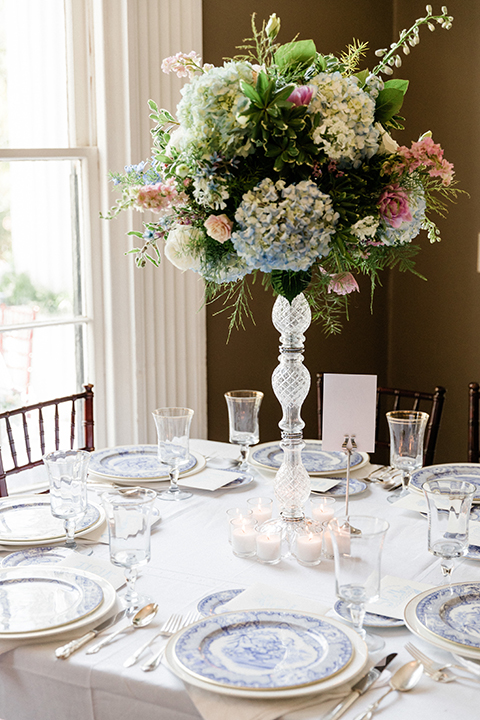 South-carolina-summer-outdoor-wedding-at-the-wickliffe-house-table-set-up-with-flowers