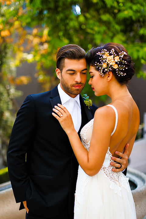 Downtown-los-angeles-wedding-shoot-at-oue-skyspace-bride-and-groom-hugging-close-up-smiling