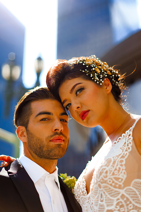 Downtown-los-angeles-wedding-shoot-at-oue-skyspace-bride-and-groom-hugging-close-up