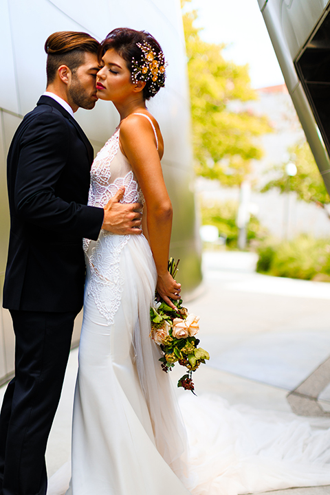 Downtown-los-angeles-wedding-shoot-at-oue-skyspace-bride-and-groom-hugging-front-view-close-up