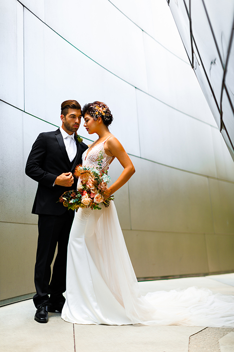 Downtown-los-angeles-wedding-shoot-at-oue-skyspace-bride-and-groom-hugging-front-view