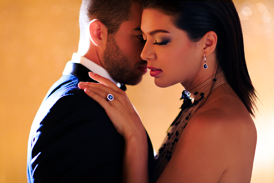 Downtown-los-angeles-wedding-shoot-at-oue-skyspace-bride-and-groom-standing-hugging-close-up