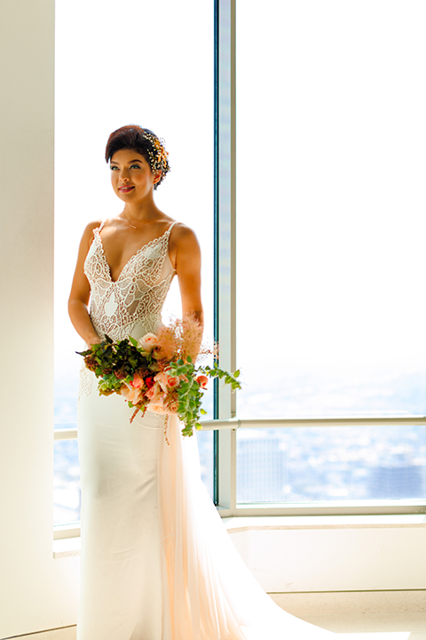 Downtown-los-angeles-wedding-shoot-at-oue-skyspace-bride-holding-bouquet