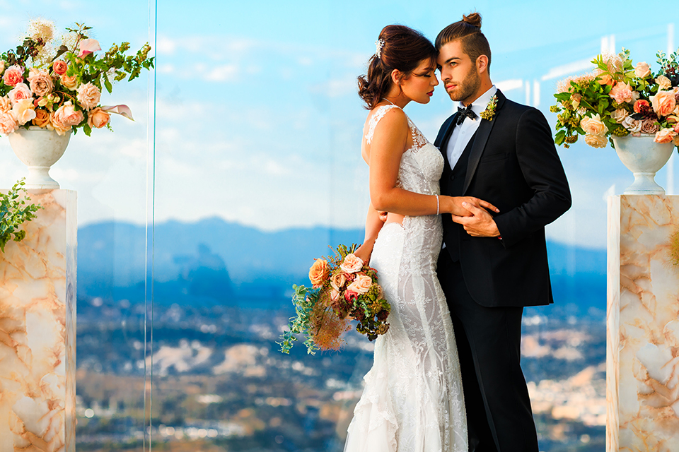 Downtown-los-angeles-wedding-shoot-at-oue-skyspace-ceremony-bride-and-groom-hugging