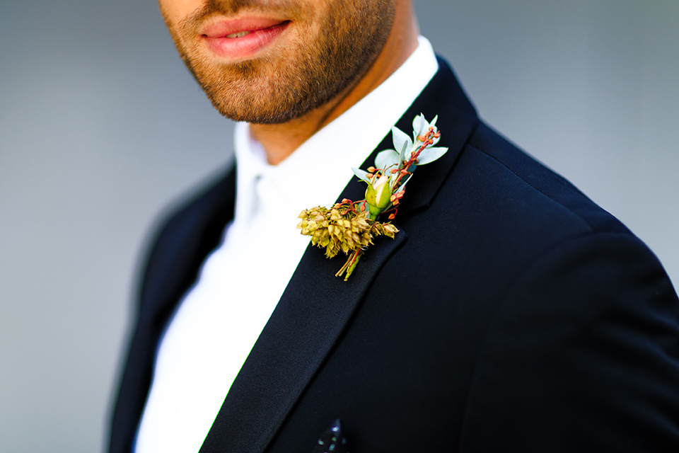 Downtown-los-angeles-wedding-shoot-at-oue-skyspace-groom-black-tuxedo-close-up