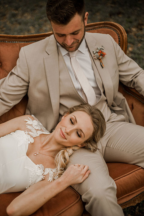 Texas-peaches-and-cream-wedding-shoot-at-carola-horse-ranch-bride-and-groom-sitting-on-couch-close-up