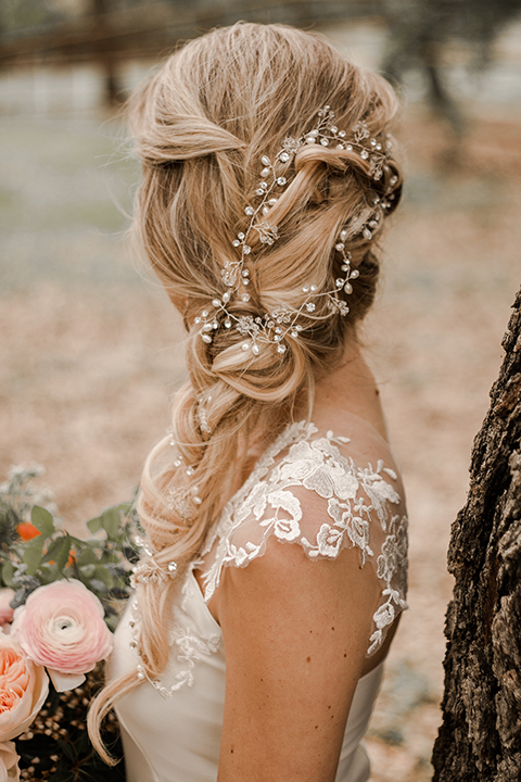 Texas-peaches-and-cream-wedding-shoot-at-carola-horse-ranch-bride-close-up-on-hair