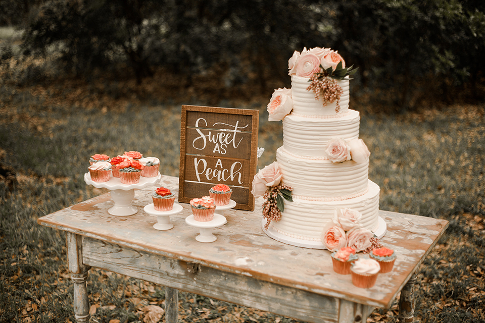 Texas-peaches-and-cream-wedding-shoot-at-carola-horse-ranch-wedding-dessert-table-with-cake