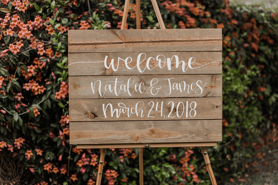 Texas-peaches-and-cream-wedding-shoot-at-carola-horse-ranch-wedding-welcome-sign