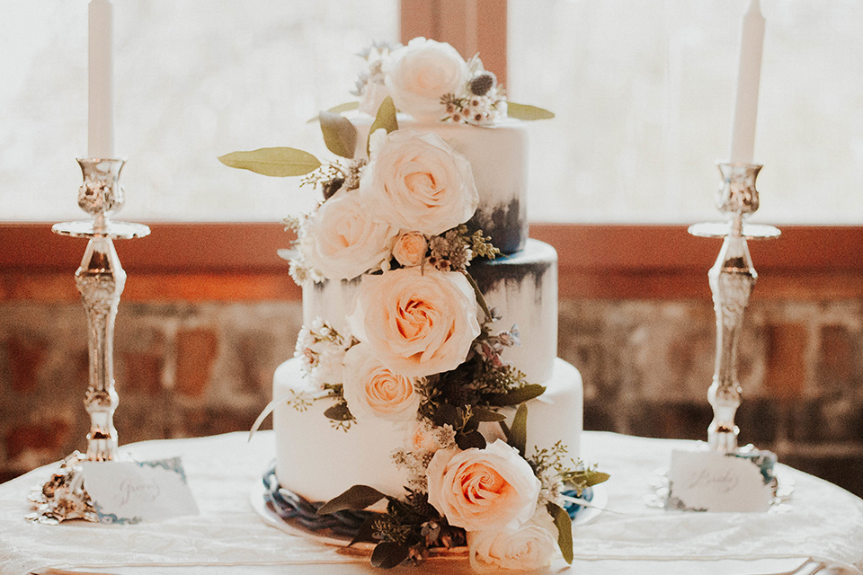The-mitten-building-shoot-cake-simple-frosting-with-floral-decor