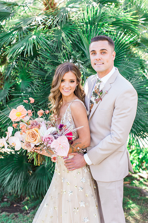 Los-angeles-garden-wedding-at-retreat-malibu-bride-and-groom-hugging