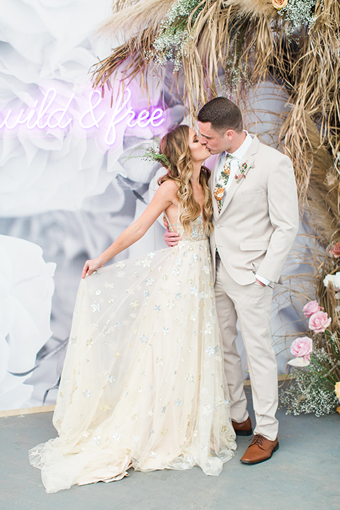 Los-angeles-garden-wedding-at-retreat-malibu-bride-and-groom-lounge-kissing