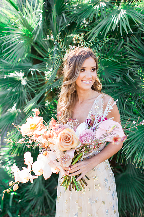 Los-angeles-garden-wedding-at-retreat-malibu-bride-holding-bouquet-smiling