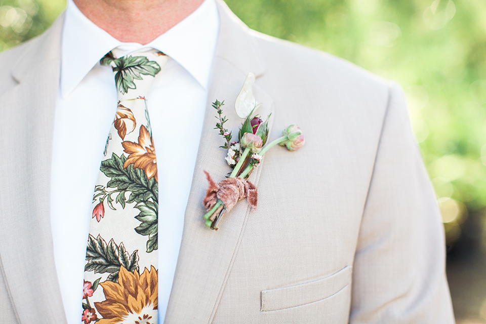 Los-angeles-garden-wedding-at-retreat-malibu-groom-tan-suit-with-floral-tie-close-up