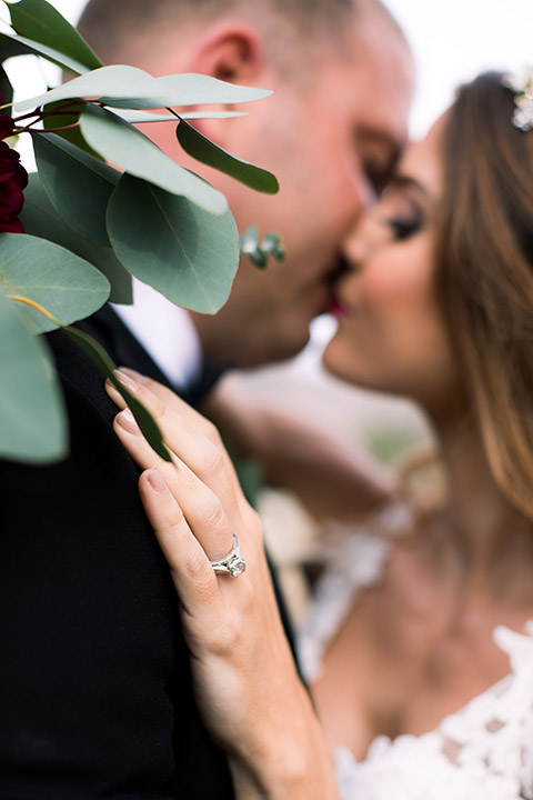 sacred-mountain-shoot-bride-and-groom-kissing-close-up-on-ring