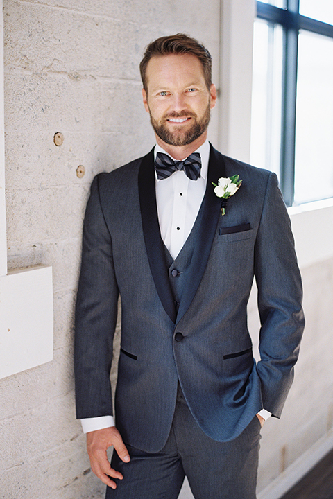 Same-sex-industrial-wedding-at-the-1912-groom-charcoal-tuxedo-close-up