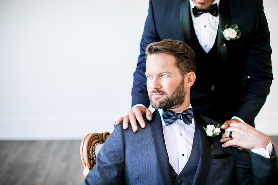 Same-sex-industrial-wedding-at-the-1912-grooms-holding-hands