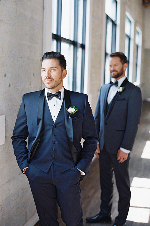 Same-sex-industrial-wedding-at-the-1912-grooms-standing