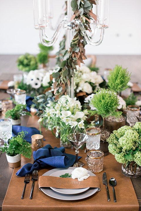 Same-sex-industrial-wedding-at-the-1912-table-set-up-with-flowers-and-place-settings