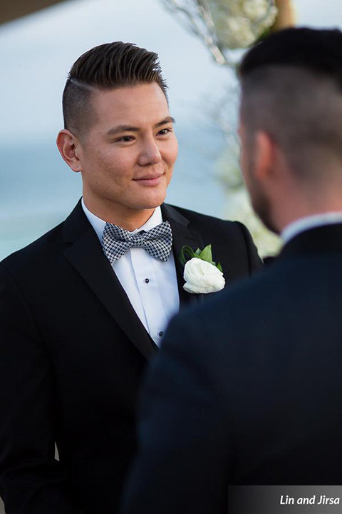 Laguna-beach-outdoor-wedding-same-sex-ceremony-grooms-holding-hands