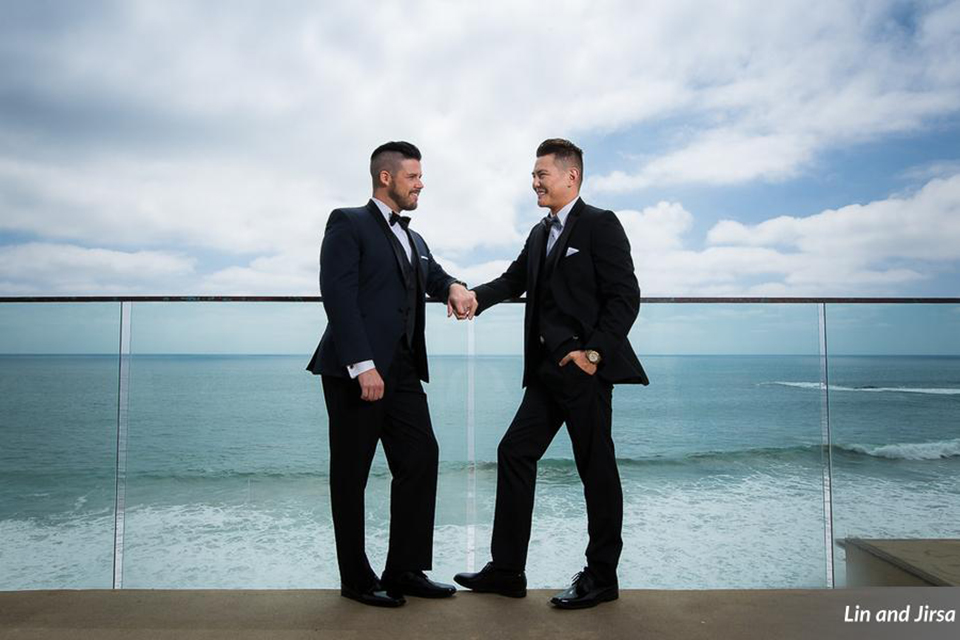 Laguna-beach-outdoor-wedding-same-sex-grooms-holding-hands