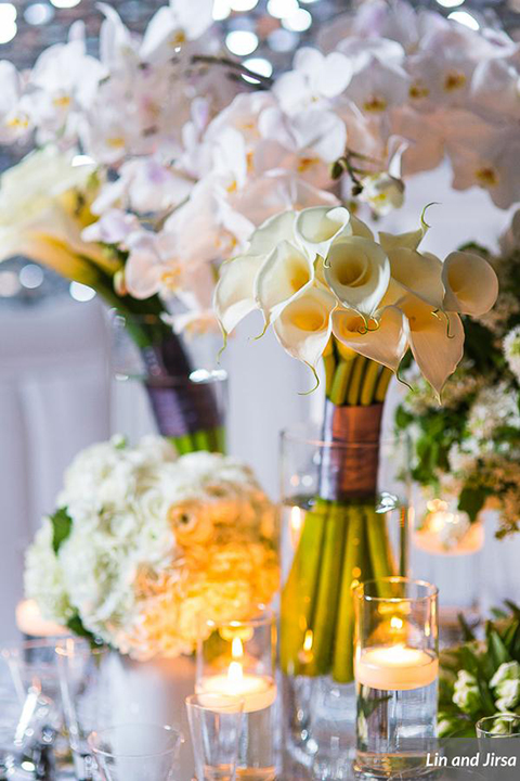 Laguna-beach-outdoor-wedding-same-sex-table-set-up-with-flowers