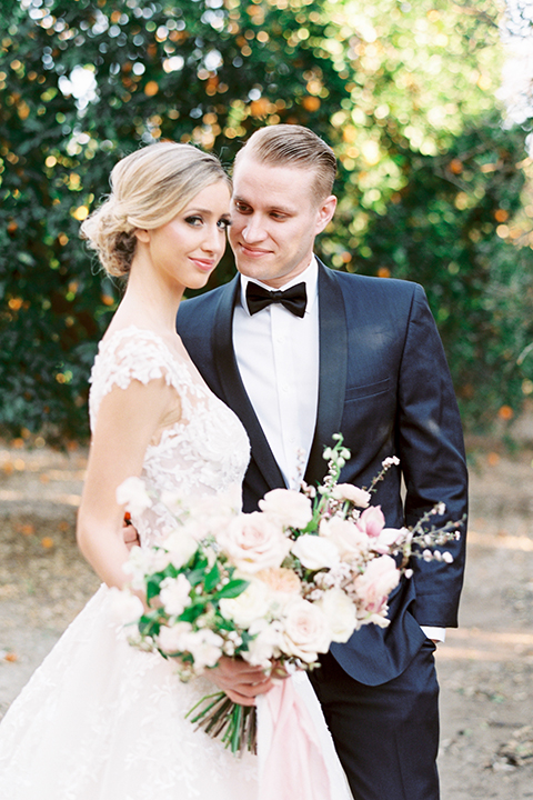 Southern-california-outdoor-wedding-at-the-orange-grove-bride-and-groom-hugging-close-up