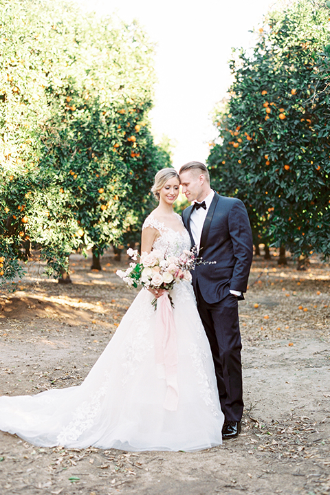 Southern-california-outdoor-wedding-at-the-orange-grove-bride-and-groom-hugging