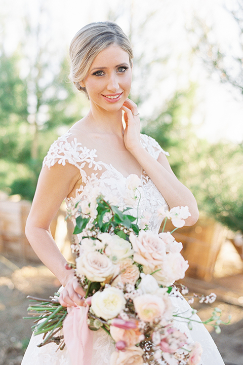 Southern-california-outdoor-wedding-at-the-orange-grove-bride-holding-bouquet-close-up