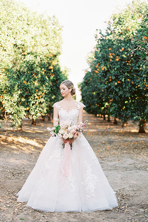 Southern-california-outdoor-wedding-at-the-orange-grove-bride-holding-bouquet