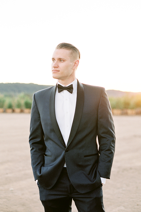 Southern-california-outdoor-wedding-at-the-orange-grove-groom-navy-blue-tuxedo-close-up