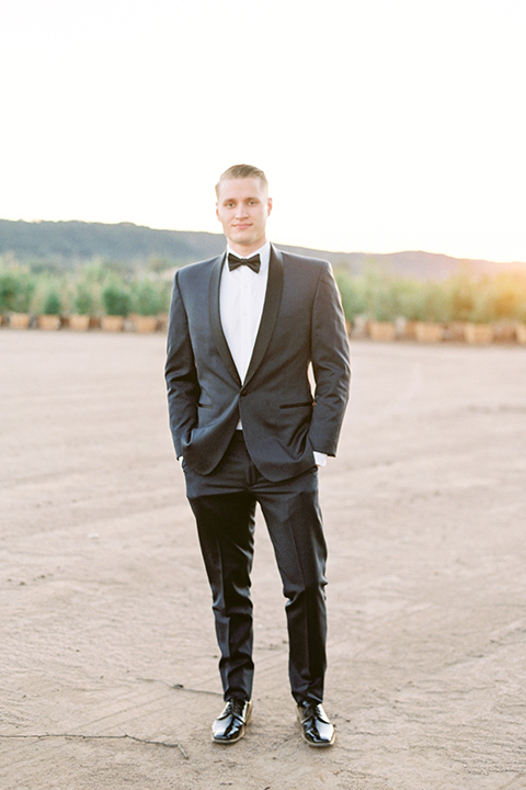 Southern-california-outdoor-wedding-at-the-orange-grove-groom-navy-blue-tuxedo