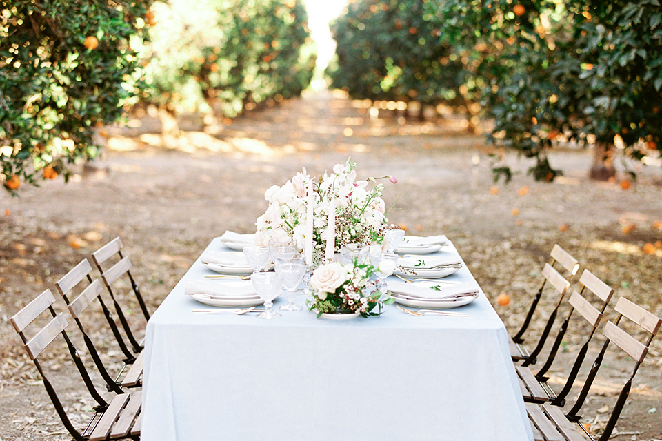 Southern-california-outdoor-wedding-at-the-orange-grove-table-set-up