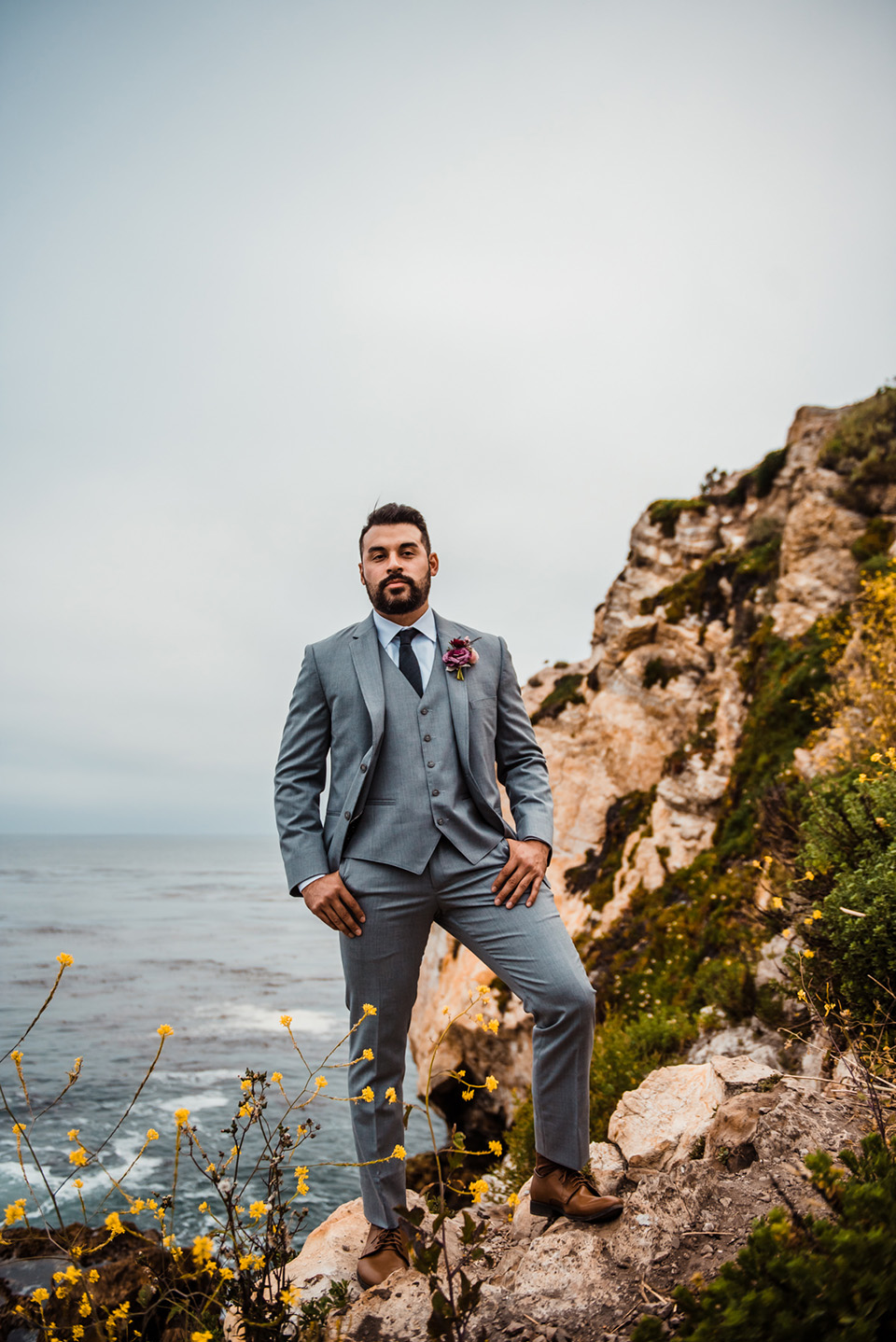 avila-beach-elopement-shoot-groom-wearing-a-light-blue-suit-with-a-navy-long-tie