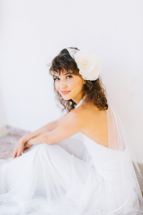 Rancho-las-lomas-blue-shoot-close-up-on-bridal-in-a-white-dress-with-a-halter-neckline