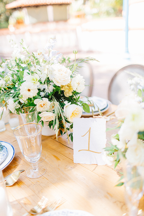 Rancho-las-lomas-blue-shoot-table-décor-with-white-linens-and-gold-decor