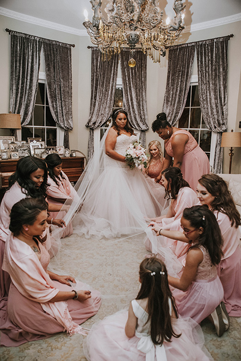 Fete-Venue-New-Orleans-Wedding-bridesmaids-in-pink-dresses-bride-in-a-strapless-ball-gown