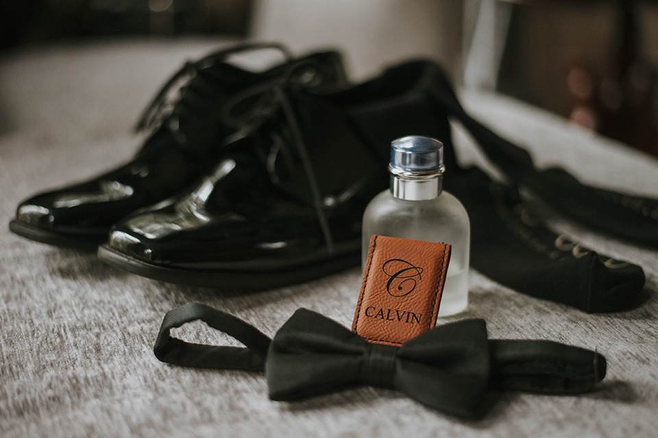 Fete-Venue-New-Orleans-Wedding-grooms-accessories-with-patent-leather-shoes-and-black-bow-tie