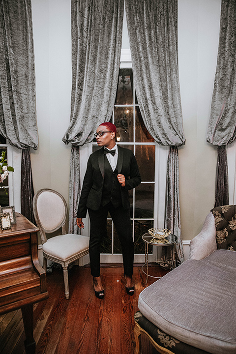 Fete-Venue-New-Orleans-Wedding-groomswoman-in-tuxedo-in-black