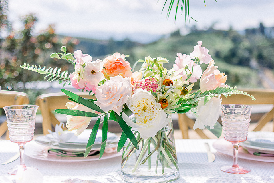 emerald-peak-temecula-wedding-florals-on-table-in-bright-tropical-colors