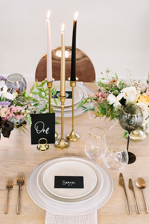 Modern-Mystical-Styled-shoot-at-the-york-table-décor-with-tall-candles-and-white-plates