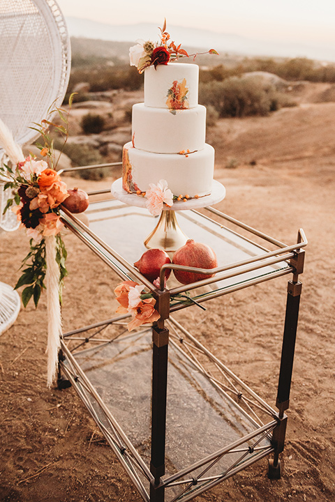 Moonflower-Ranch-Shoot-cake-with-white-fondant-and-orange-flower-decor