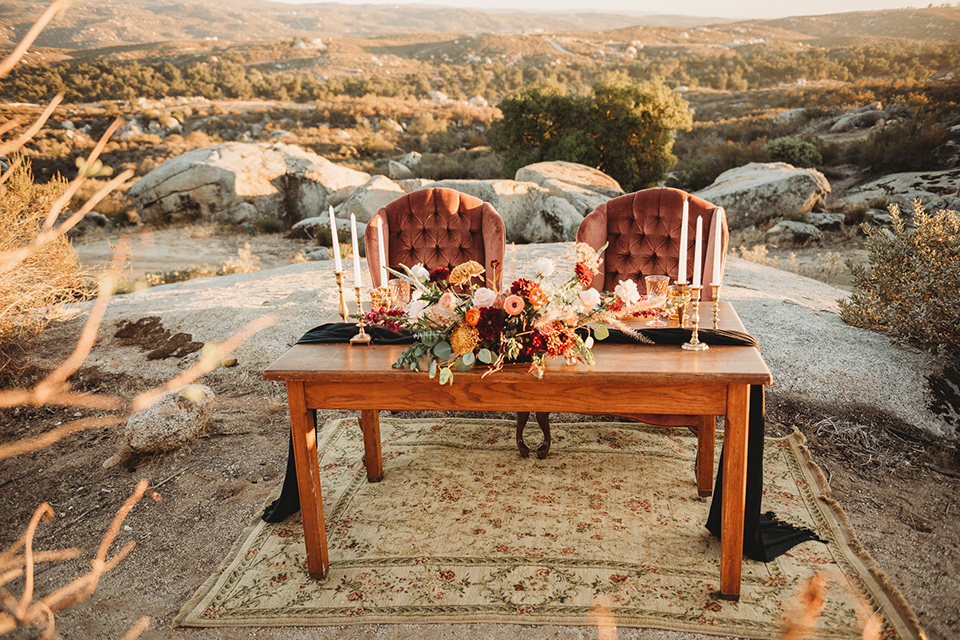 Moonflower-Ranch-Shoot-table-and-chairs-with-wooden-table-and-tall-candles