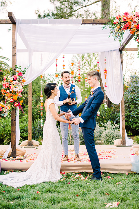 Supriya-and-Chris-wedding-bride-and-groom-smiling-at-ceremony