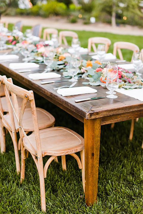 Supriya-and-Chris-wedding-table-décor-with-wooden-tables-and-chairs