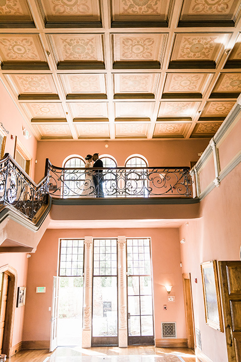 Maxwell-House-bride-and-groom-on-steps-inside