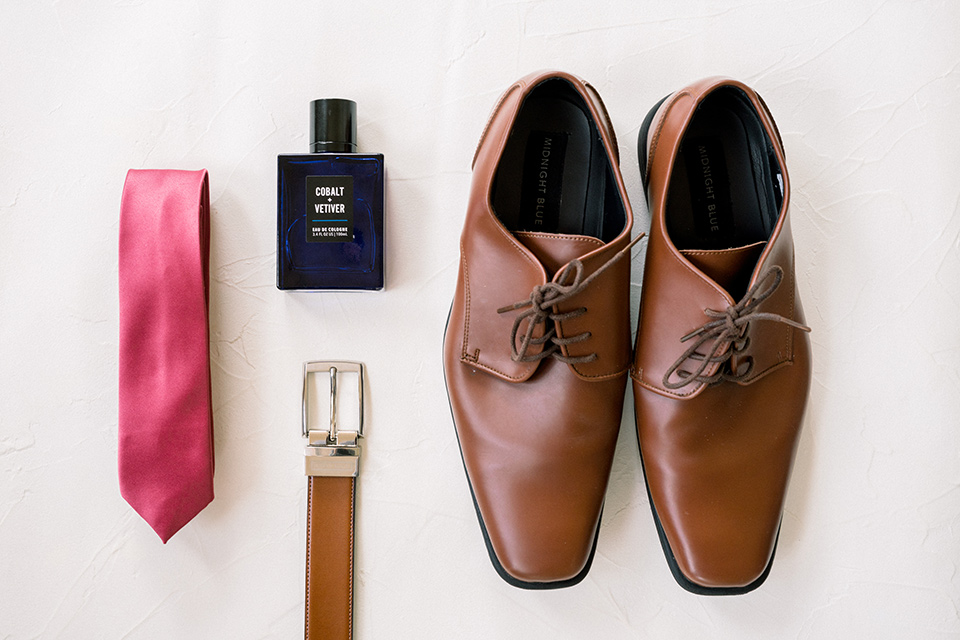 community-church-wedding-groomsmen-accessories-with-brown-dress-shoes-a-red-tie-and-brown-belt